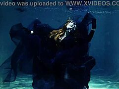 Arya Grander's seductive underwater performance in a swimming pool