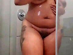 Solo shower play of curvy MILF with big ass