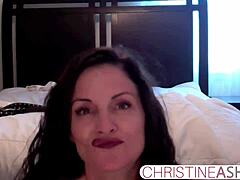 Webcam girl Christineash shows off her big boobs in strap-on masturbation video