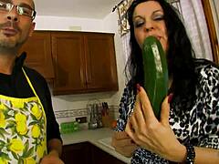 Tattooed brunette housewife enjoys deepthroating and face fucking in the kitchen